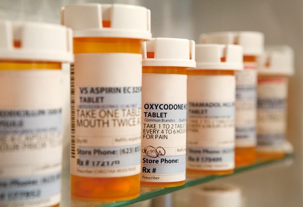 loved one addicted to prescription drugs - prescription drug bottles - Fair Oaks Recovery Center