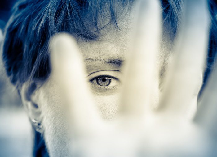 drug addiction consequences - woman hiding her face - calley recovery center