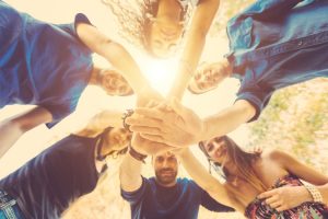 group with hands in middle of the circle - Fair Oaks Recovery Center of nevada - reno outpatient - intensive outpatient treatment for drug and alcohol addiction