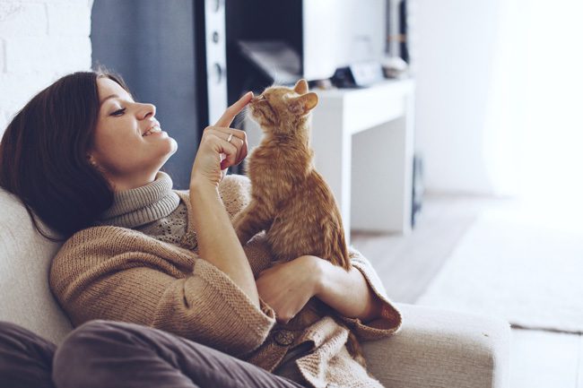 Practicing-Self-Care-When-a-Loved-One-Suffers-from-Addiction - woman with cat