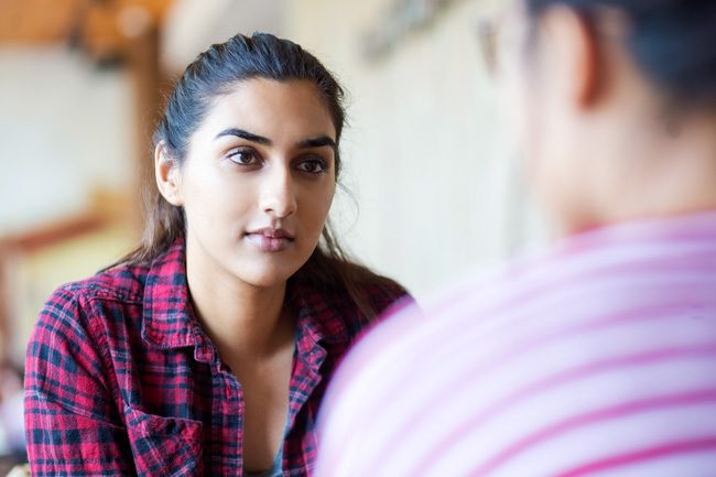 what to say to support their recovery, woman talking to friend - words hurt
